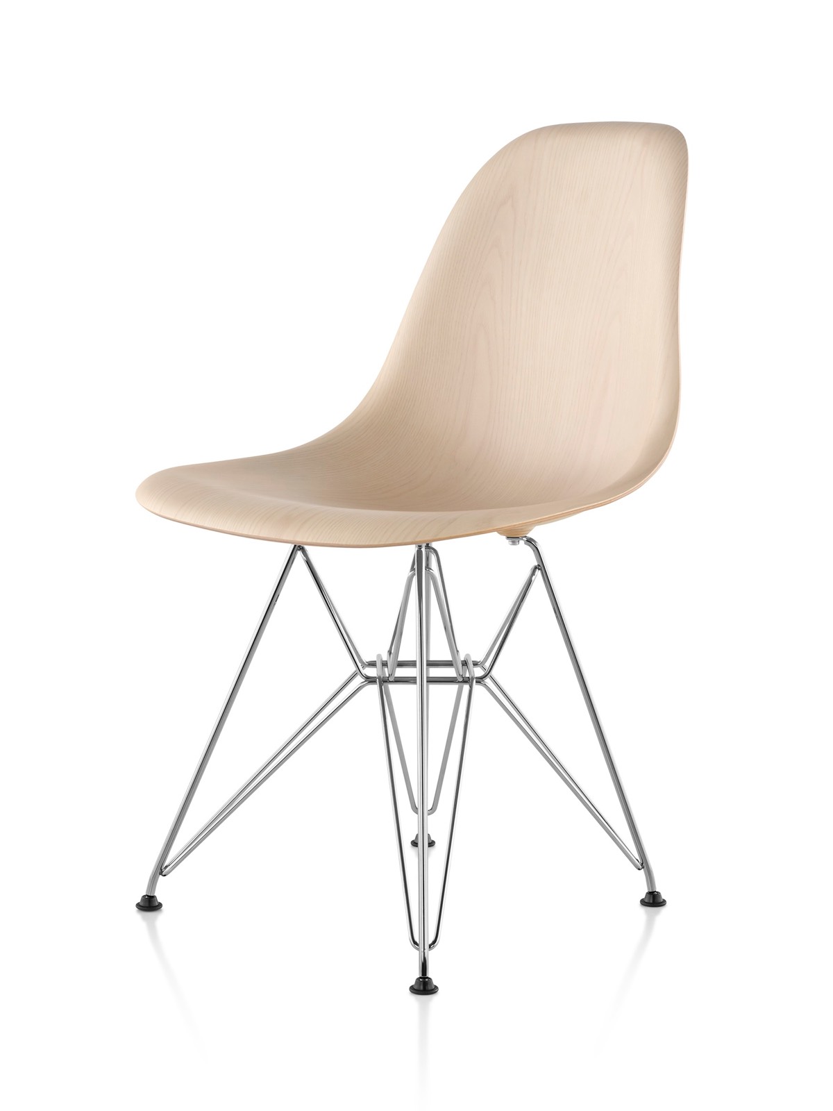 Eames Molded Wood side chair with a light finish and wire base, viewed from a 45-degree angle. Eames Molded Wood side chair with a light finish and wire base, viewed from a 45-degree angle.