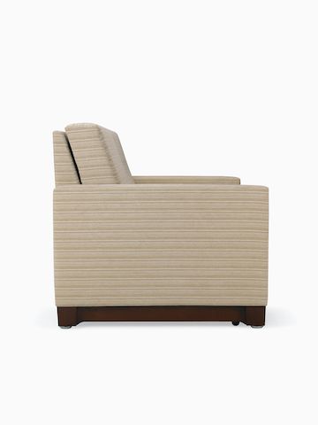 Nemschoff Beaumont Sleep Chair and Settee in tan upholstery, viewed from the side.