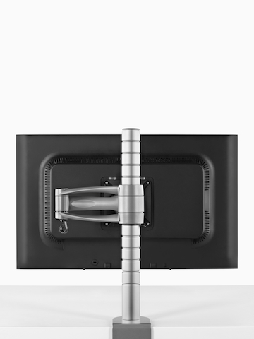 Un solo monitor conectado a un poste del brazo del monitor Wishbone. Seleccione para ir a la página del producto Wishbone.